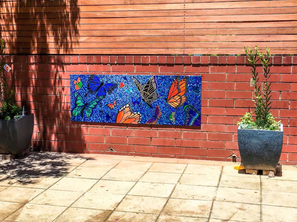 Butterfly Mosaic 1.6m x 0.65m stained glass butterfly mosaic. Commissioned by Magill Primary School