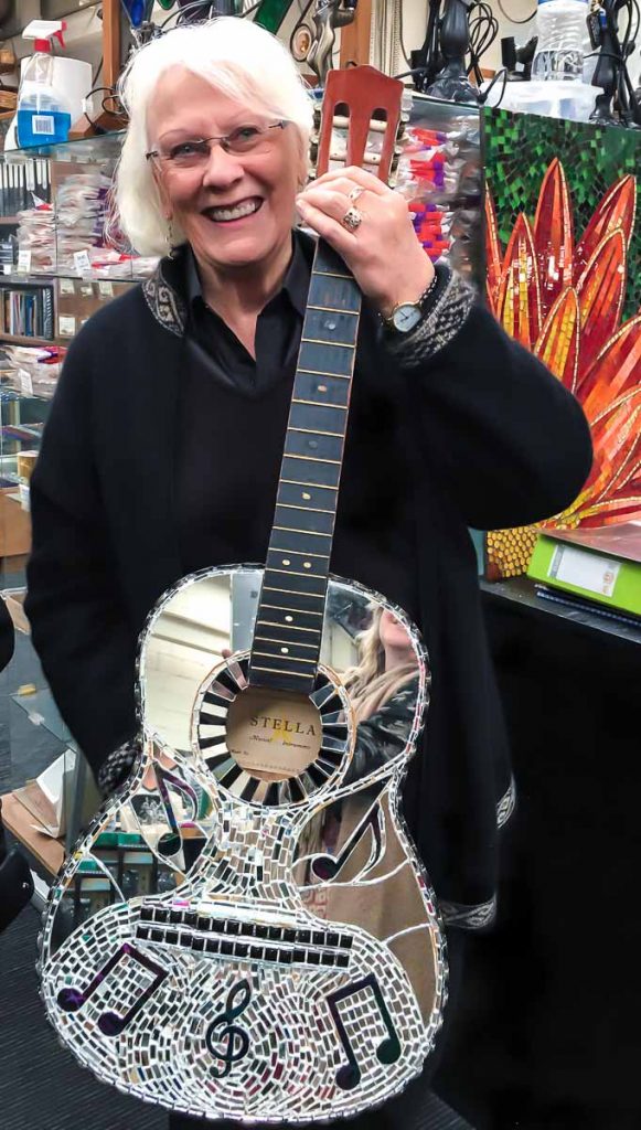 Glenys Heinrich: Mirror and stained glass mosaic guitar